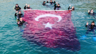 Bitlis’in Adilcevaz ilçesinde dalgıçlar, 30 Ağustos Zafer Bayramı dolayısıyla Van Gölü’nde Türk bayrağı açtı. Doğu Deniz Derneği üyesi 12 dalgıç, Van Gölü’nde 24 metrekare büyüklüğünde Türk bayrağı açarak 30 Ağustos Zafer Bayramı’nı kutladı. Dernek Başkanı Cumali Birol, gazetecilere, özgürlük mücadelesinin […]
