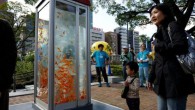 In many cities, payphones are rapidly disappearing from the streets, which is no real surprise in a world where most people carry a cellphone. But what do you do with all those old phone booths? A Japanese art collective has […]