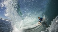 With blue waves tumbling over them, these surfers glide underneath a tunnel of water. The surfers are pictured in a barrel, where the wave is hollow when it is breaking, and wiping out from the unique perspective of under the […]