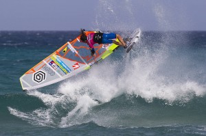 Learn how to cartwheel while windsurfing with the help of