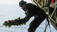 by Petty Officer 3rd Class Kim Reaves, U.S. Coast Guard Water stretches as far as the eye can see, and the air is chilled. The ocean’s surface is studded with memorial wreaths as the shadow of a fixed-wing plane passes […]