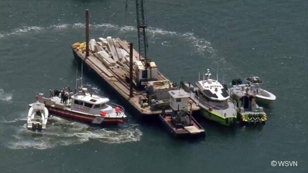 The tugboat pushing a barge that slammed into a sailboat
