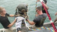 Army 7th Dive Detachment Divers SSG Fred Bible and SPC Julio Melendez wore lead boots and a drysuit — weighing a total of 220 pounds — and the last two Mark 5 vintage hard hats certified for operational use on […]