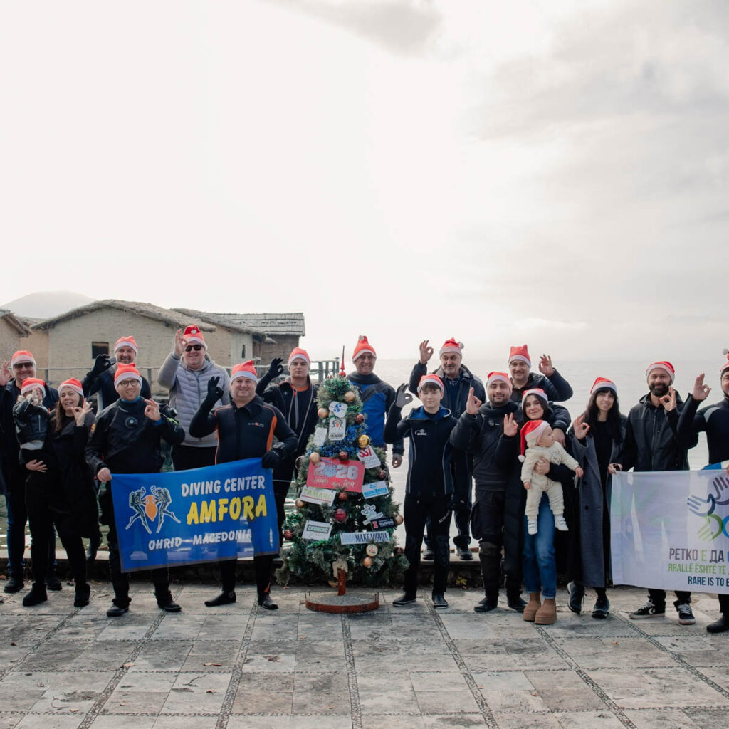 Macedonian Divers Continue Underwater Christmas Tradition in Lake Ohrid Each winter, as festive lights appear across towns and cities,
