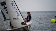 by Kevin Gunn It’s 4:45pm on a Friday afternoon in New Orleans and thirteen 420s with high school sailors aboard have lined up for a start on Lake Pontchartrain. Parents decked out in their kid’s school colors set up their […]