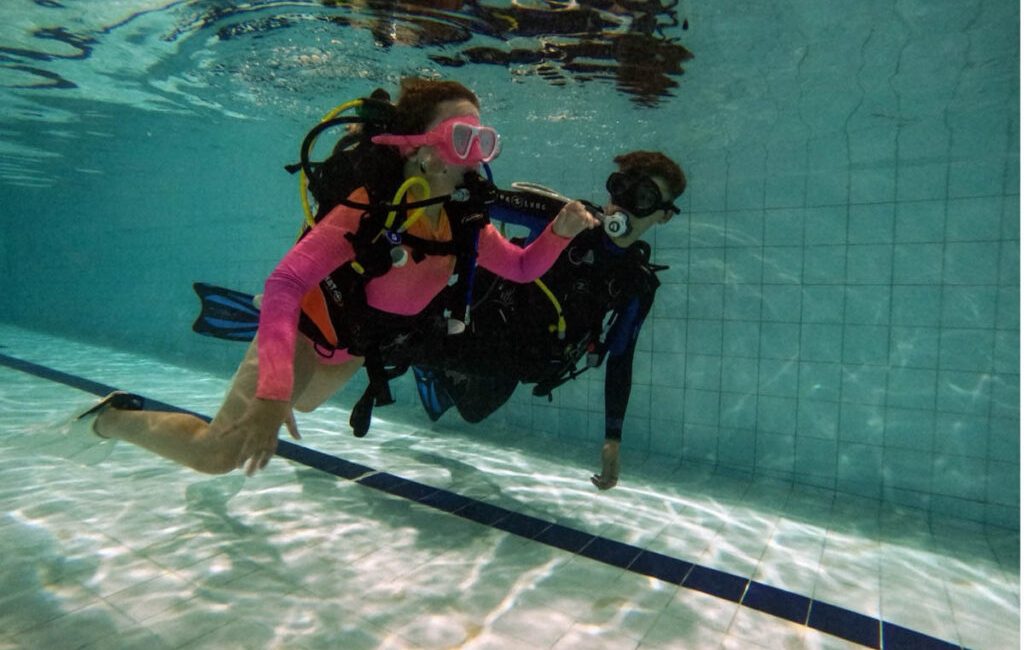 From Try Dive to Qualified Diver: Why Retention Is the Real Challenge in Youth Scuba If you spend any time around youth scuba, the early