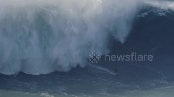 Brazilian surfer Felipe Cesarano flattened by monster 60ft wave at