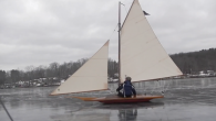 Mike Acebo provides this video of the Antique Great South Bay Scooter sailing on Bantam Lake, CT. Using the jib to steer, the Scooter keeps from sliding due to four runners, fitted oak timbers on the bottom shaped to a […]