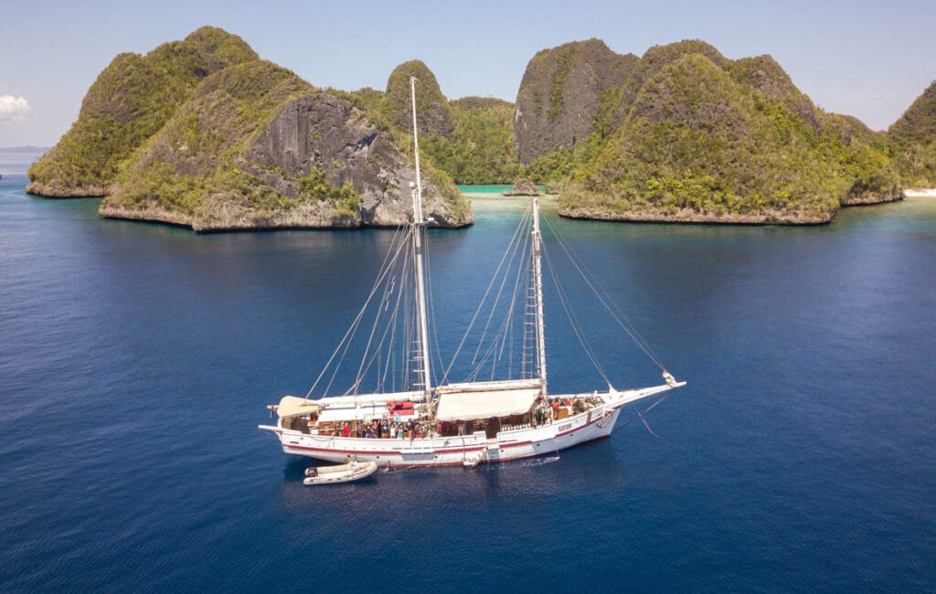Imagine touring the biodiverse waters of Raja Ampat aboard a
