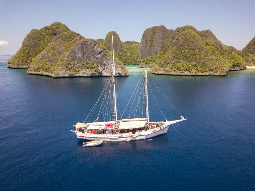 Imagine touring the biodiverse waters of Raja Ampat aboard a