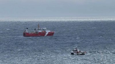 A fishing vessel broke apart and has drifted onto the