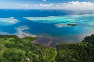 An aerial view of a coastline near Rainbow Reef and