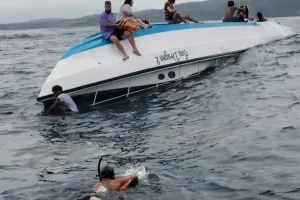 Passengers waiting to be rescued on the capsized Sea Dragon